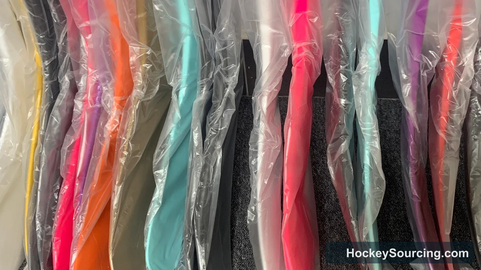 Multiple packaged hockey stick blade curves in different finishes