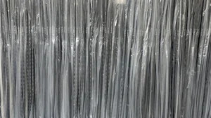Packaged hockey sticks arranged by curve and flex specification